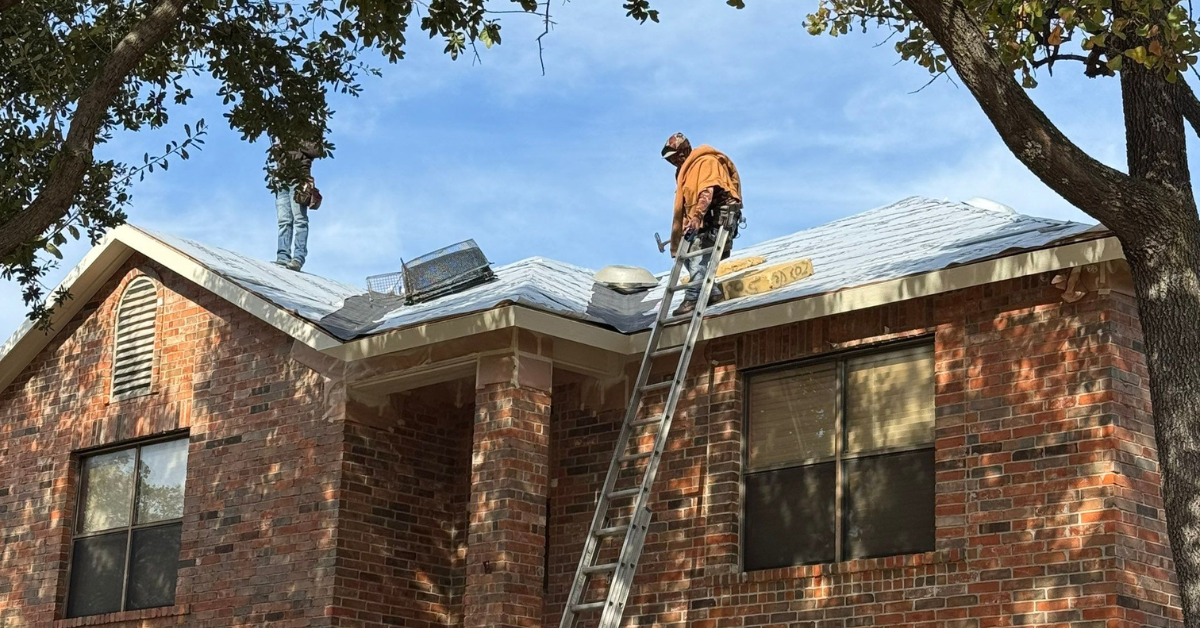 Residential roof replacement by DFW Roofers in Corinth, Texas, highlighting team working on roof